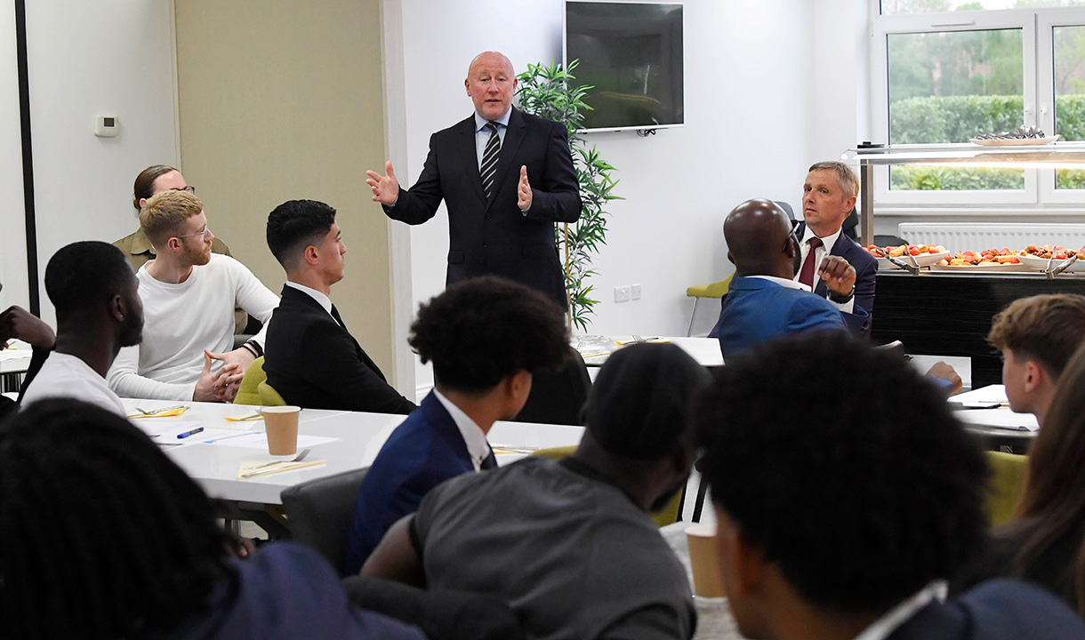 Kenny Brown speaks at the Scholars induction evening