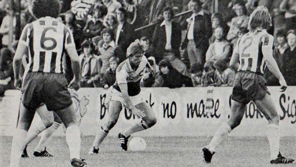 Trialist Bert van Marwijk of AZ Alkmaar shows Colchester United defenders how the Dutch do it