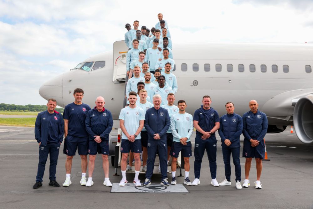 The West Ham squad board their plane to Prague