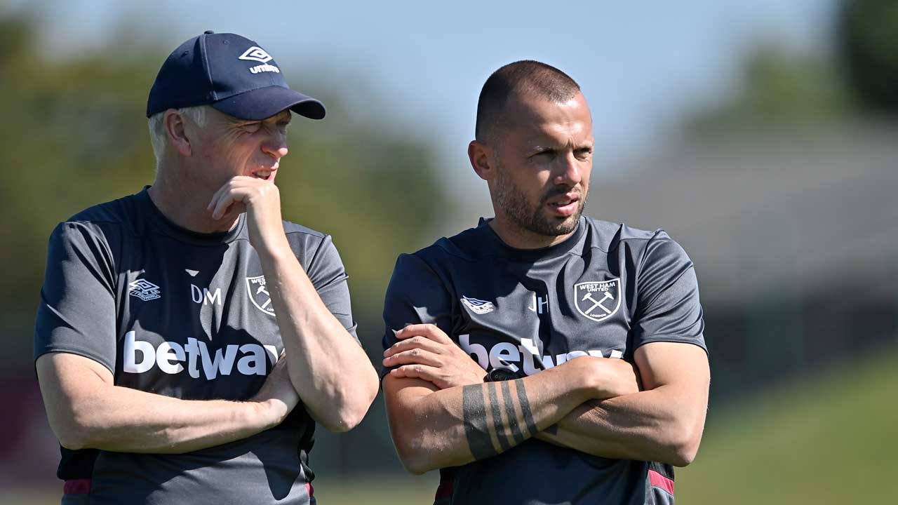 John Heitinga and David Moyes