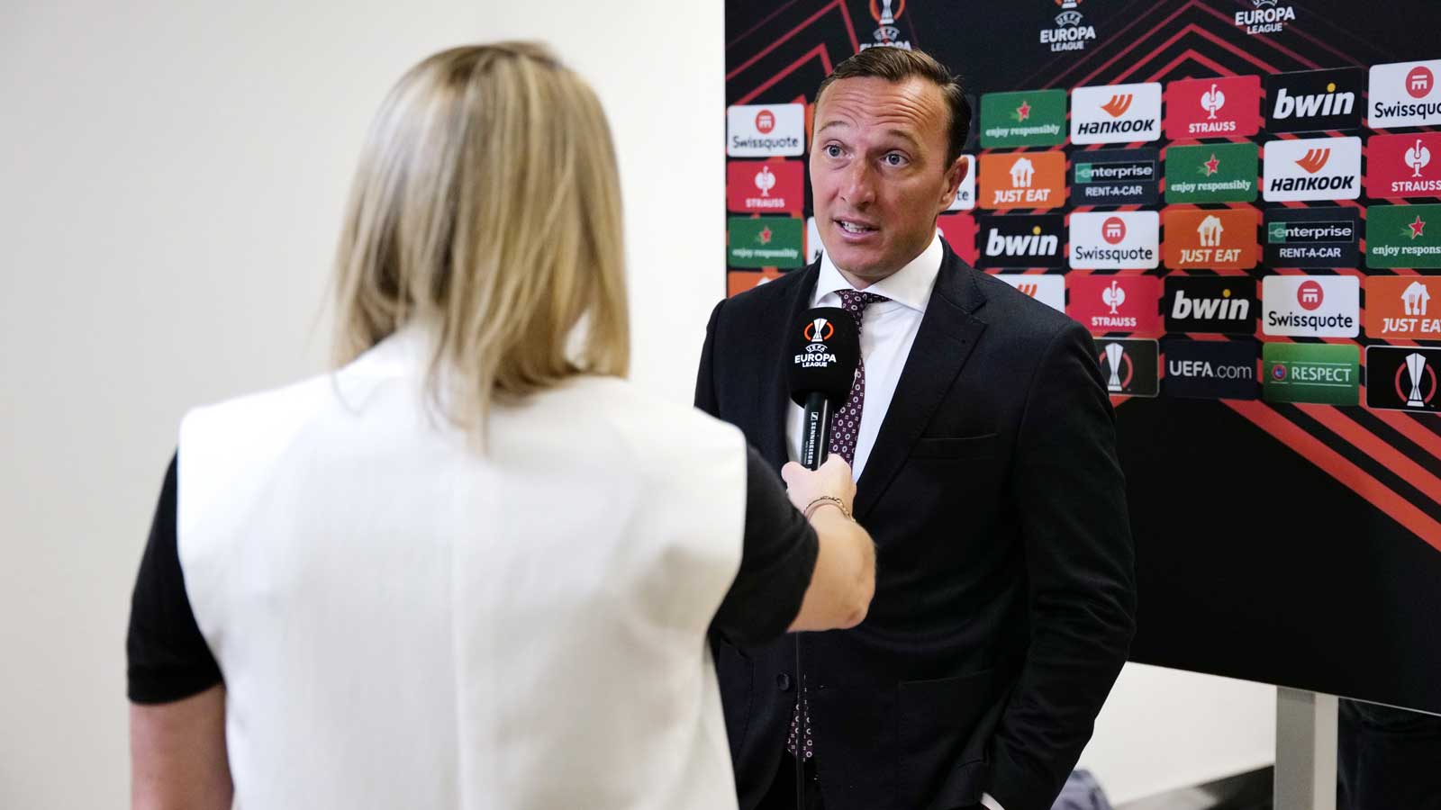Mark Noble is interviewed at the UEFA Europa League draw