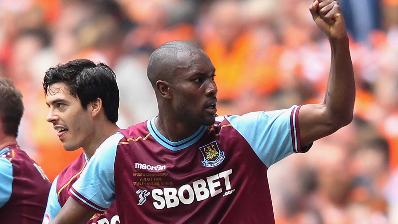 Carlton Cole celebrates his goal against Blackpool in the play-off final