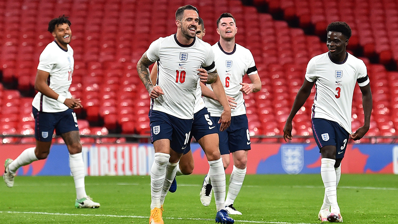 Danny Ings celebrates his goal for England against Wales