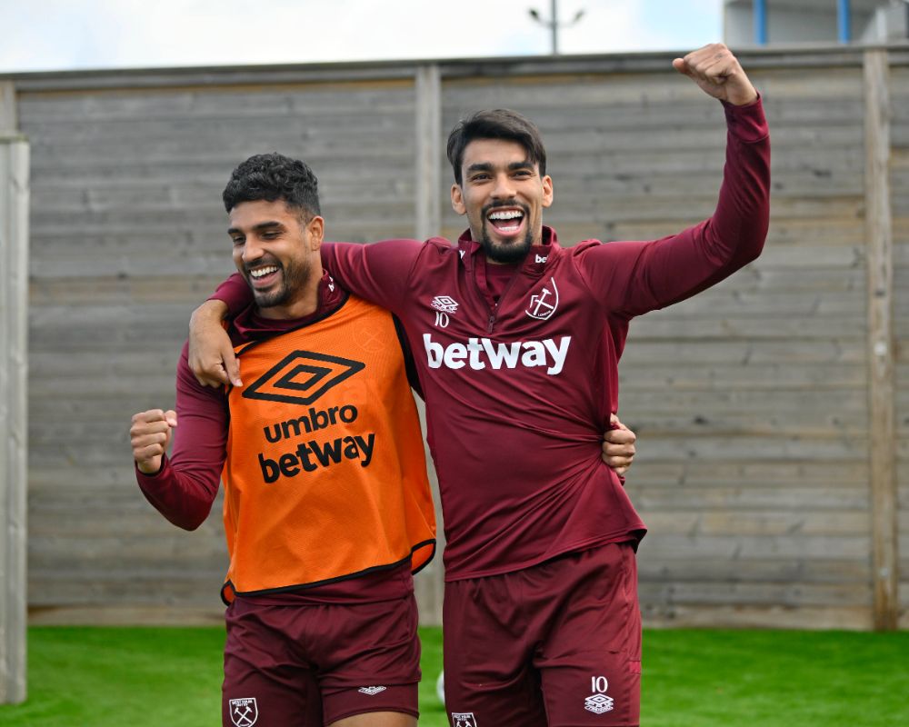 Emerson and Lucas Paquetá celebrate in training