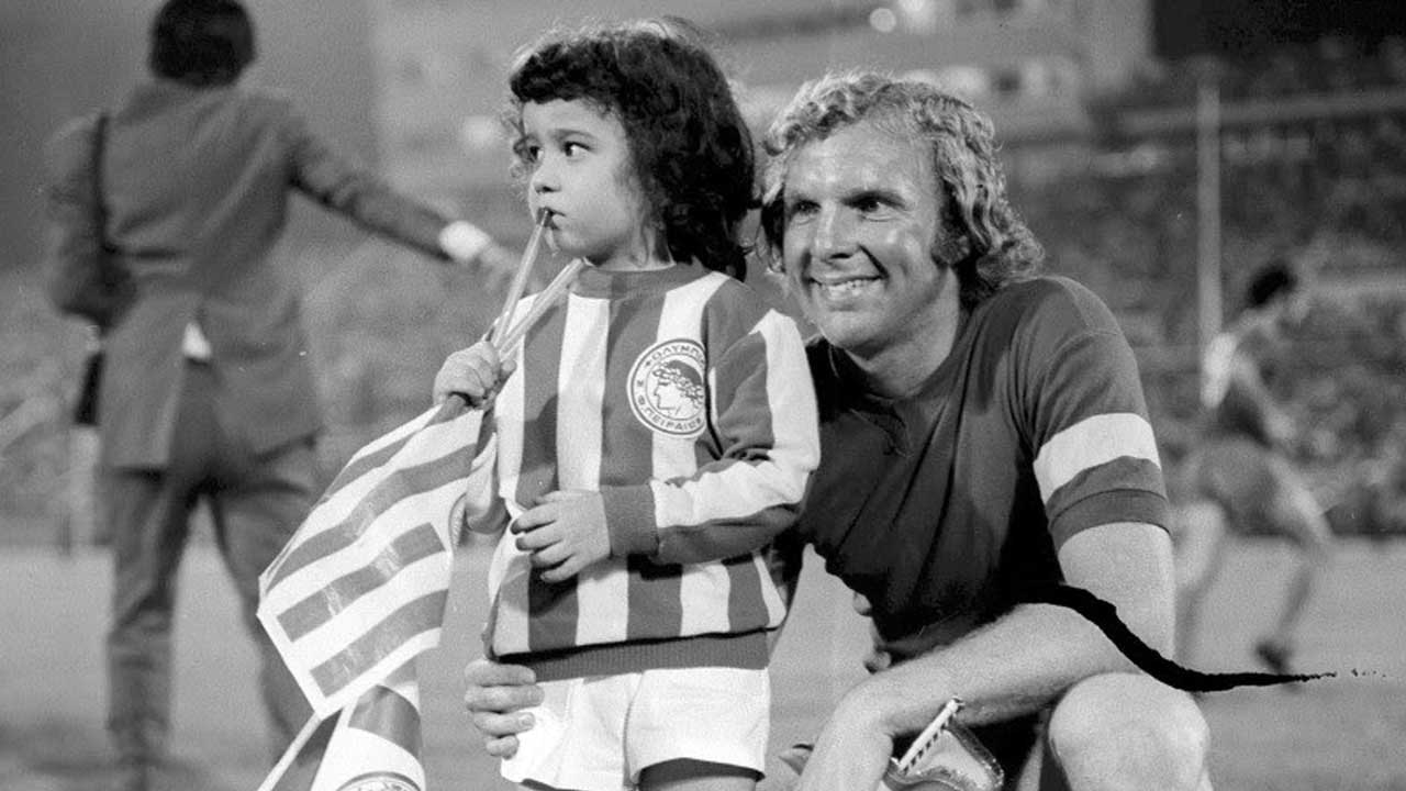Moore with the Olympiacos mascot