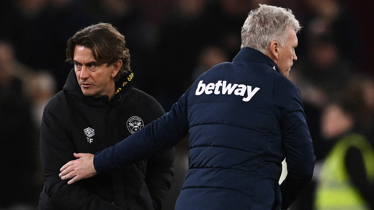 David Moyes and Thomas Frank embrace after a match between West Ham United and Brentford