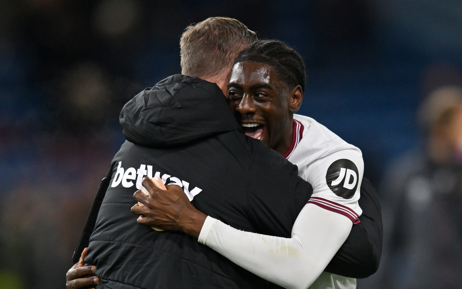 Divin Mubama celebrates at full-time at Burnley