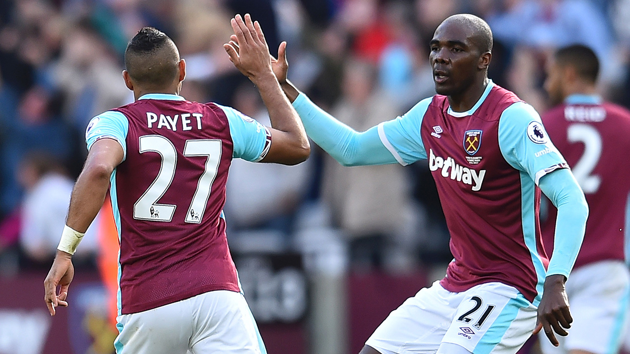 Angelo Ogbonna celebrates with Dimitri Payet at West Ham's win over Middlesbrough in 2017