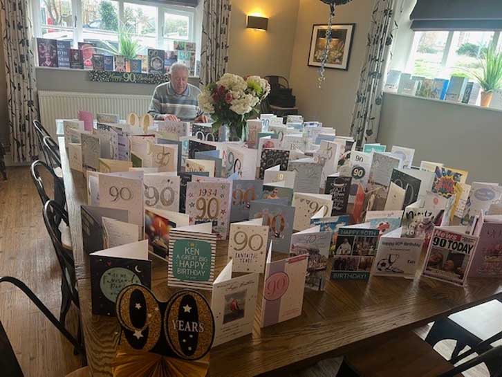 Ken Brown with the 90th birthday cards he received from Hammers fans