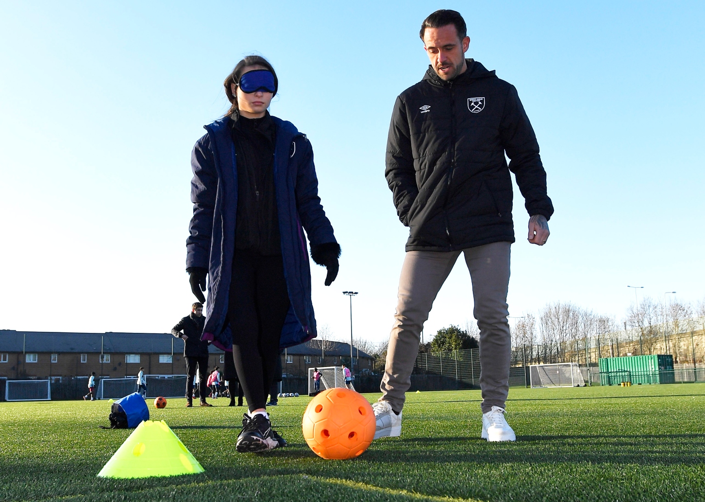 Danny Ings teams up with student Thalia Lewis for the on-pitch activities at the Foundation