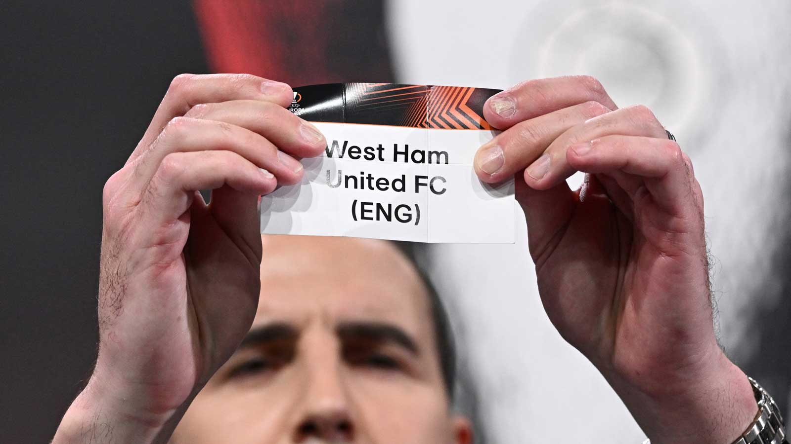 John O'Shea with West Ham United's draw slip at the UEFA Europa League round of 16 draw