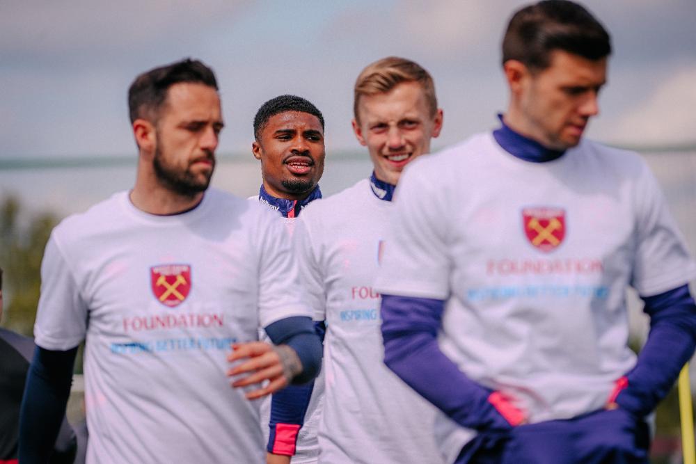 Danny Ings, James Ward-Prowse and Aaron Cresswell in West Ham United Foundation t-shirts