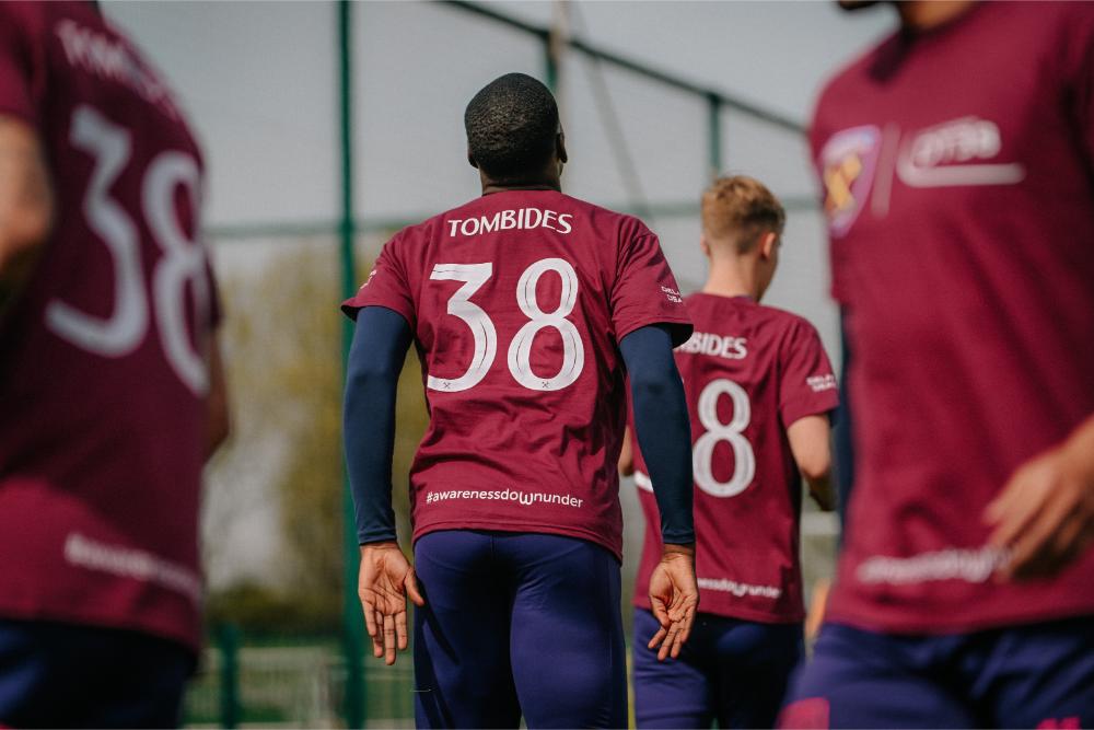 West Ham United players train in DT38 shirts