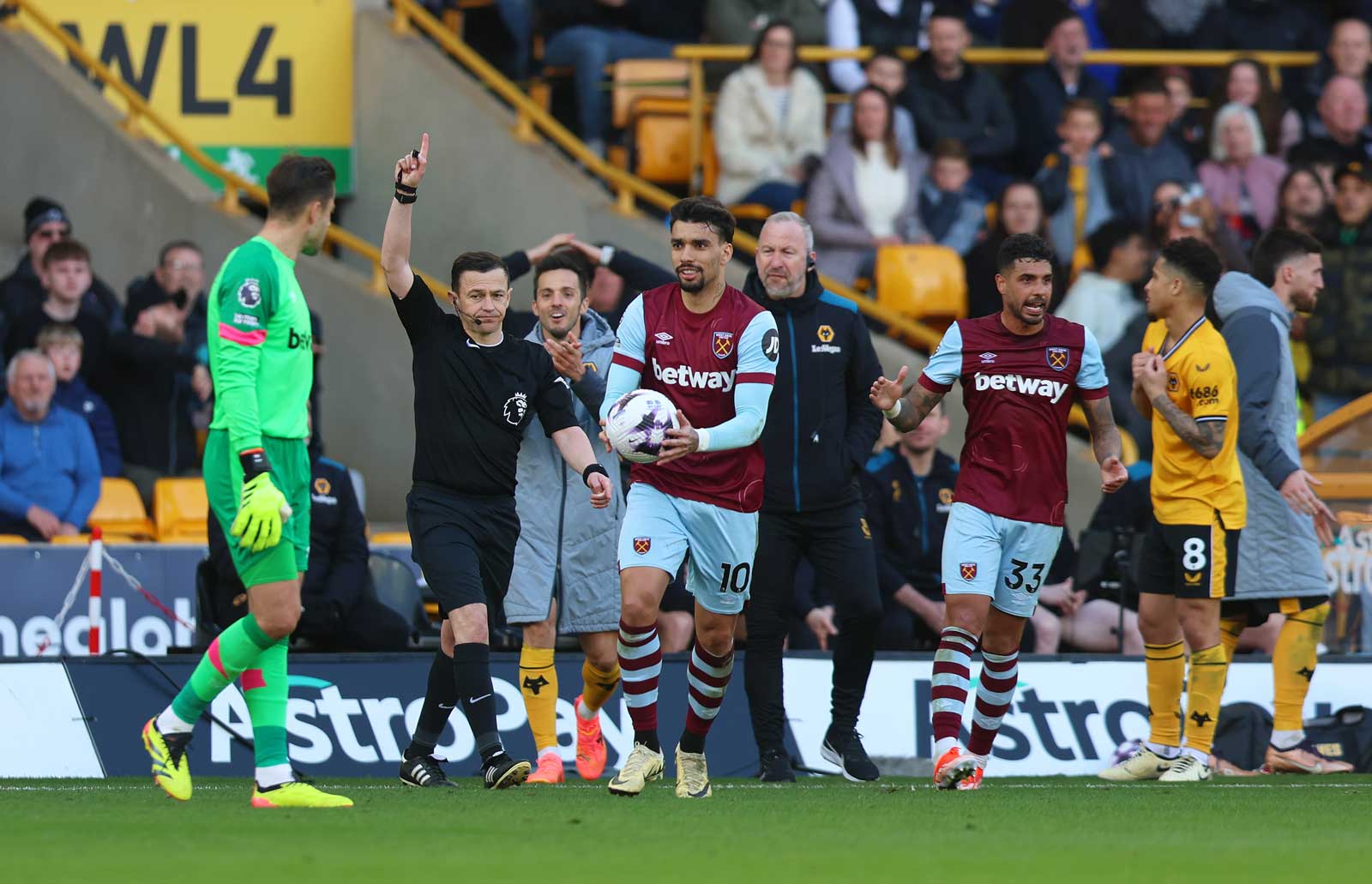 Players react after Wolves have a late goal disallowed