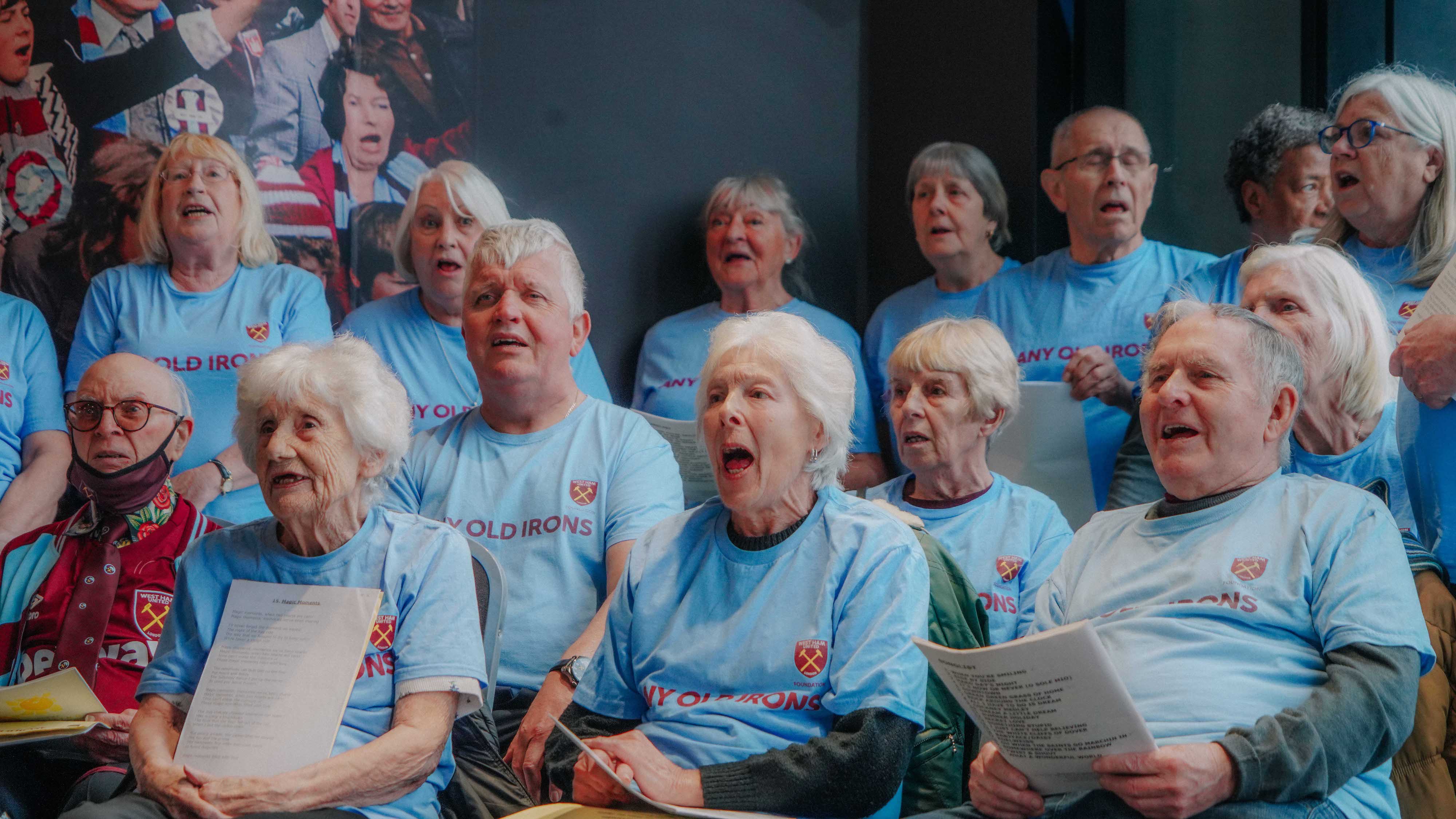 Any Old Irons singing at stadium store café