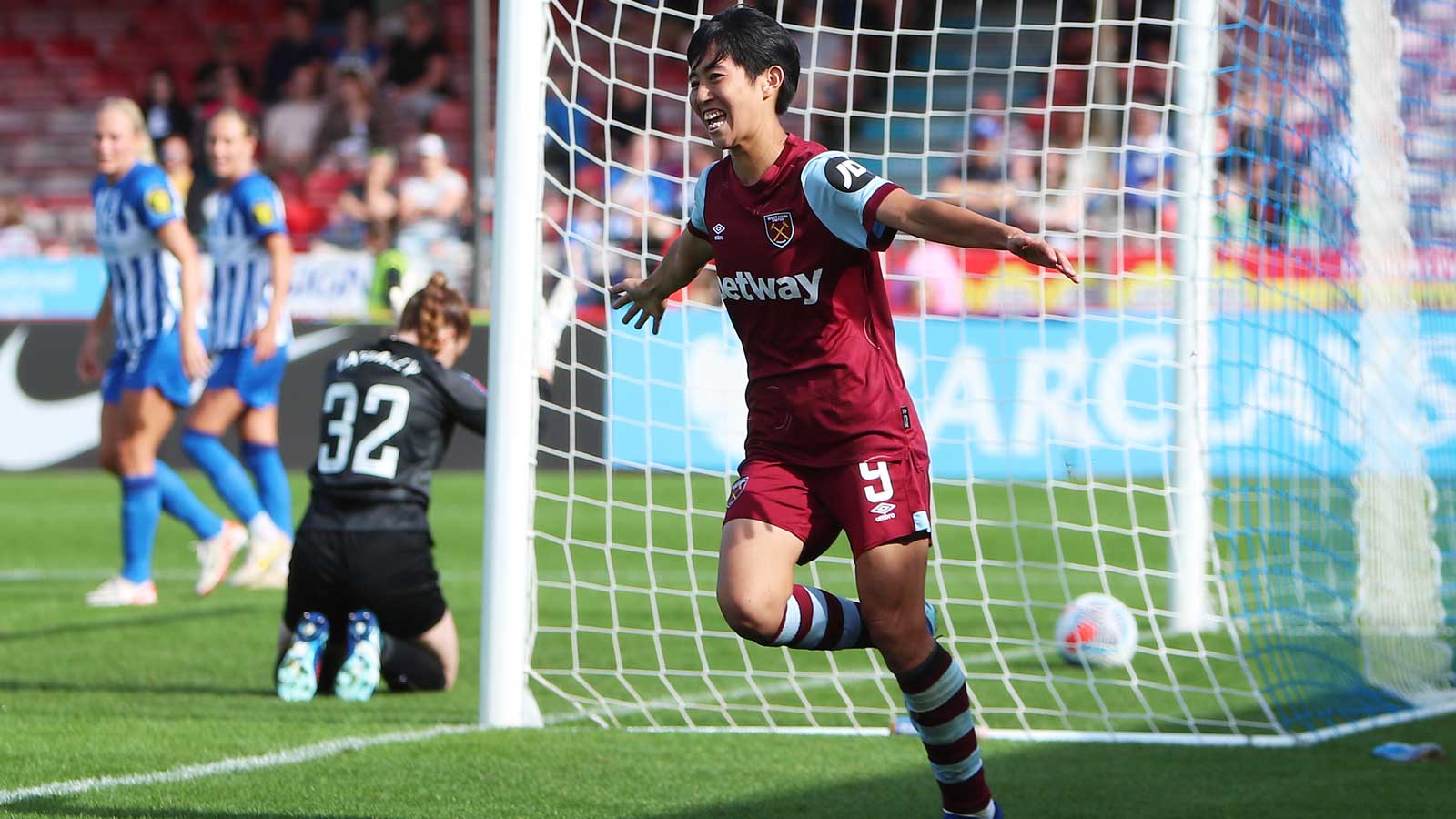 Riko Ueki celebrates scoring against Brighton & Hove Albion