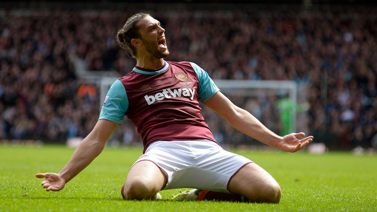 Andy Carroll celebrates scoring against Arsenal in April 2016