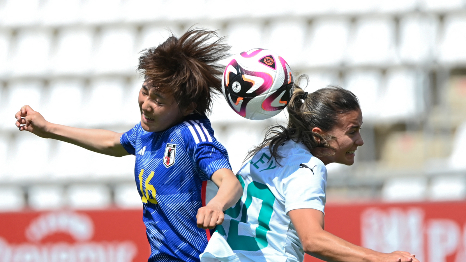 Honoka Hayashi battles for a header in Japan's win over New Zealand