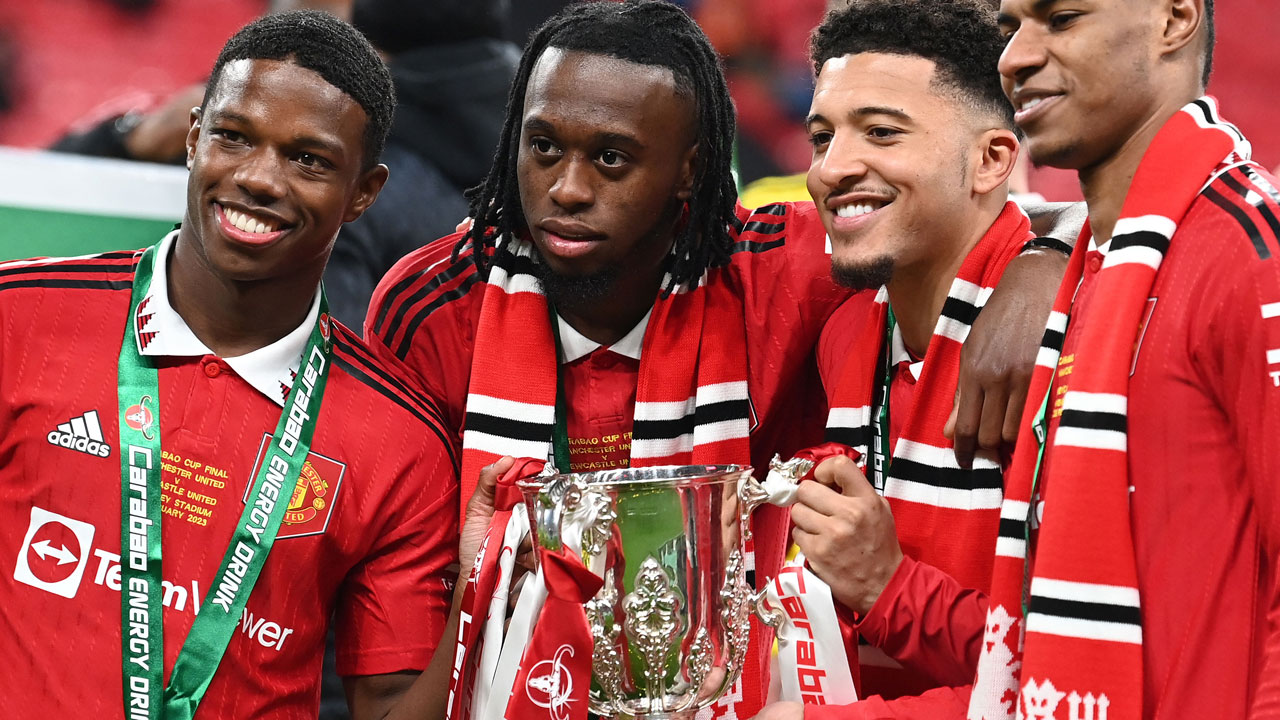 Aaron Wan-Bissaka celebrates winning the EFL Cup