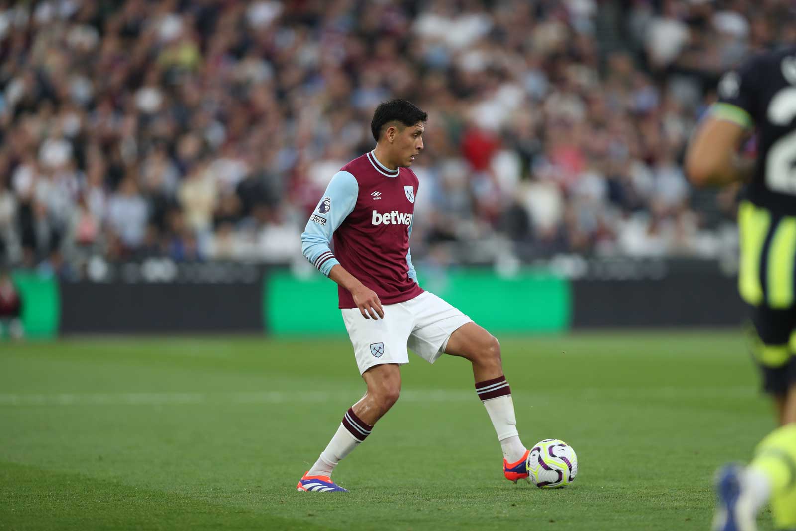 Edson Álvarez in action against Manchester City