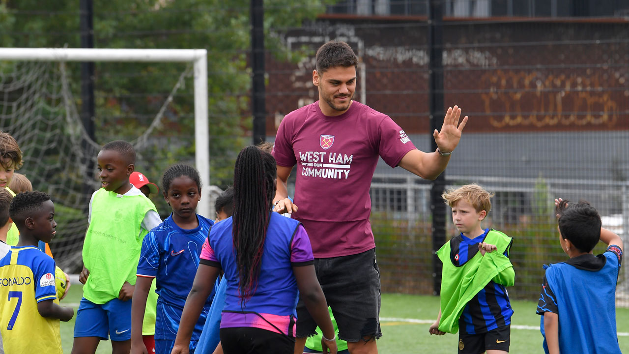 Dinos Mavropanos gets stuck into some coaching drills