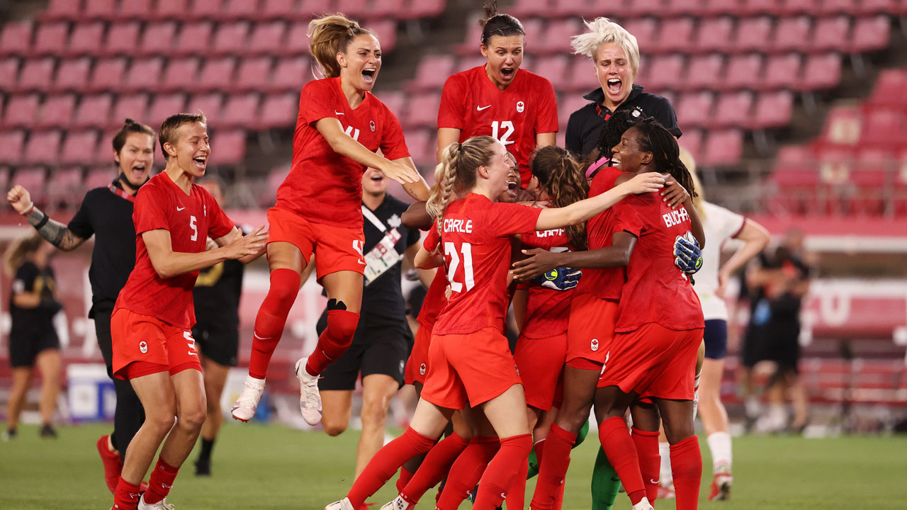 Shelina Zadorsky celebrates victory with Canada