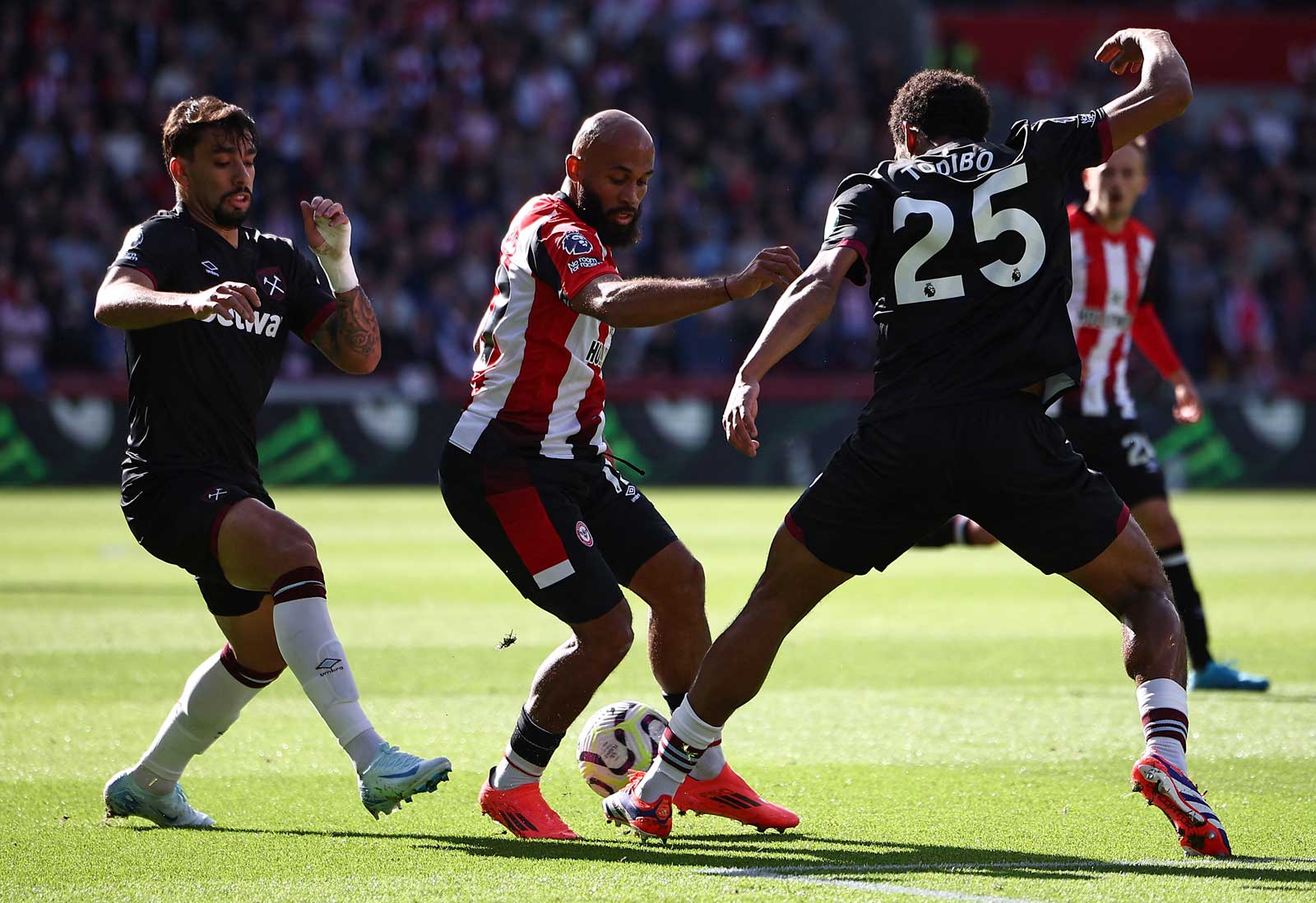 Jean-Clair Todibo tackles Brentford's Bryan Mbeumo