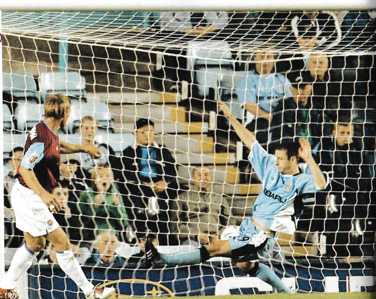 Teddy Sheringham scores against Coventry