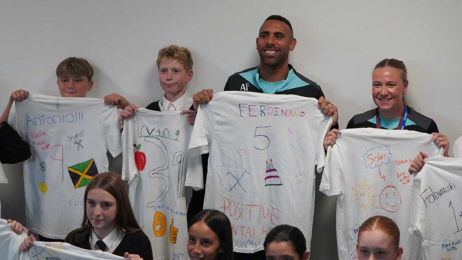 Anton Ferdinand with students