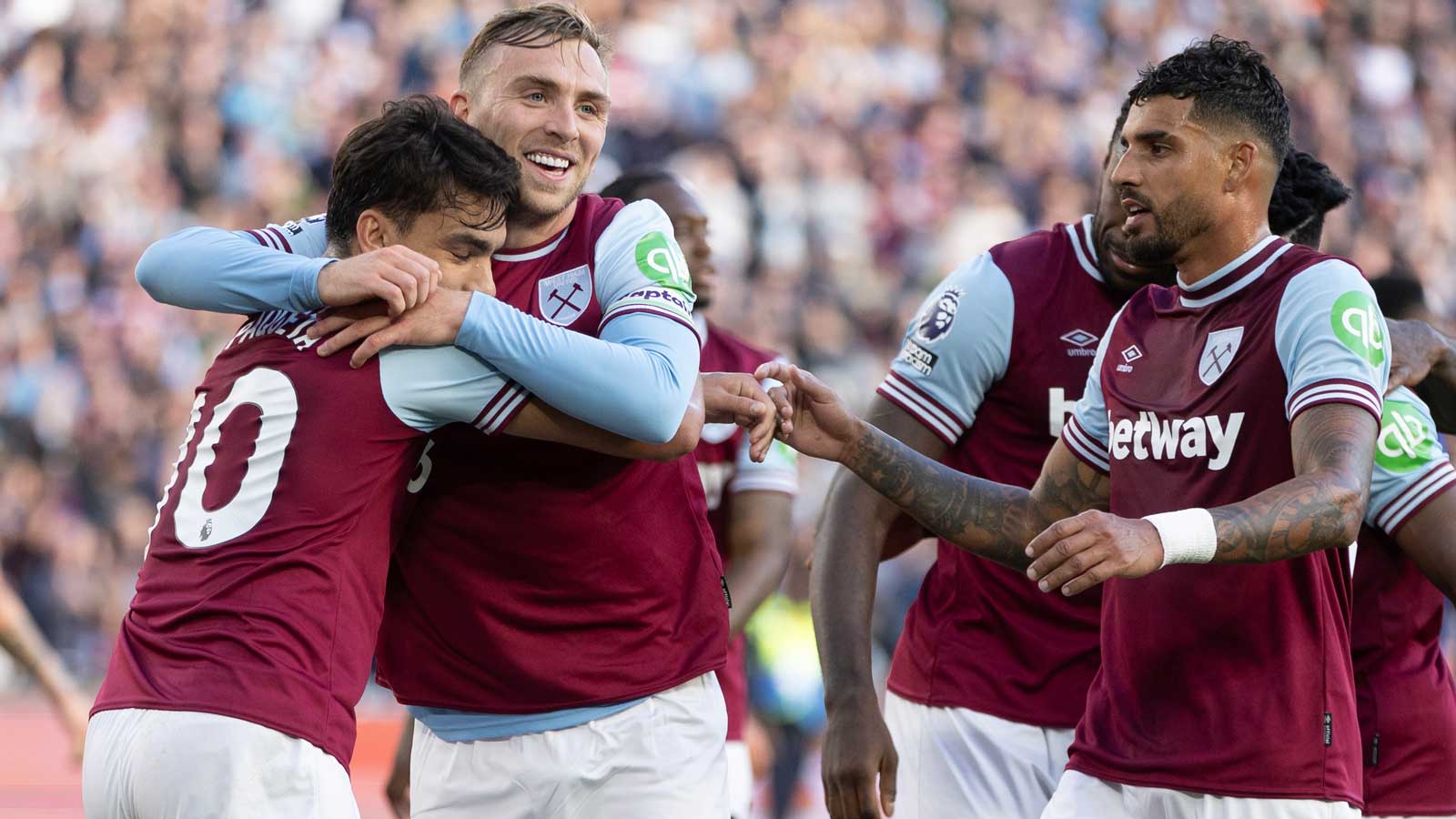 Emerson celebrates with Lucas Paquetá and Jarrod Bowen after the Brazilian scored the Hammers' fourth against Ipswich