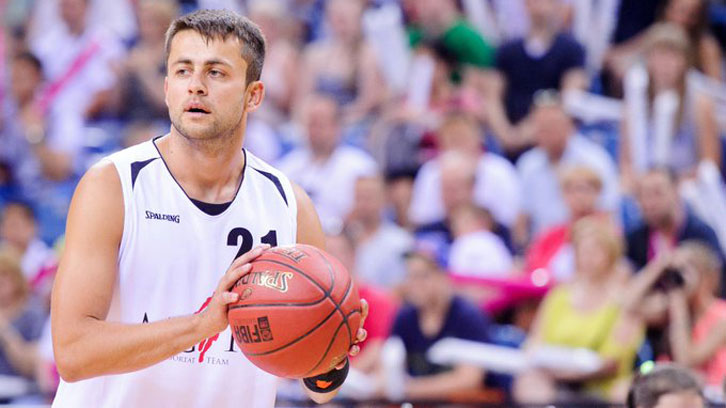 Lukasz Fabianski playing basketball