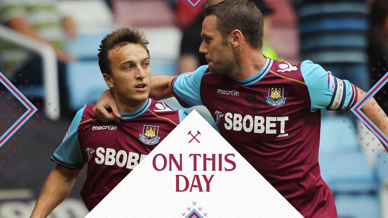 Kevin Nolan celebrates with Mark Noble