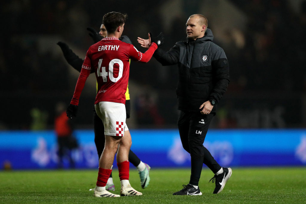 George Earthy and Liam Manning celebrate