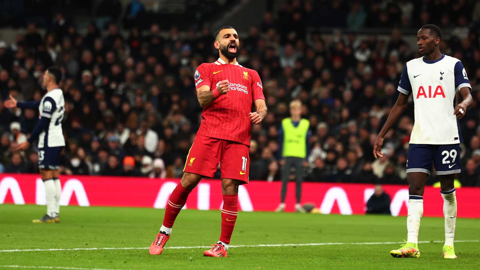 Mohamed Salah celebrates scoring at Tottenham