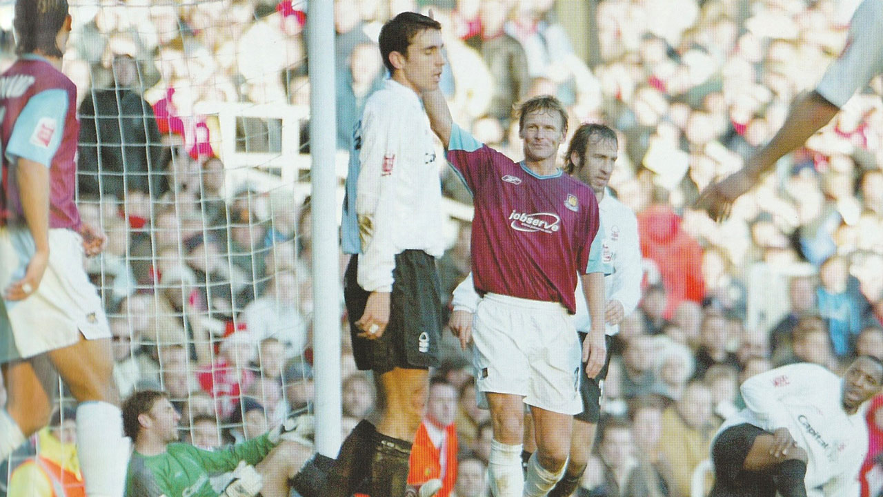 Teddy Sheringham celebrates scoring in December 2004