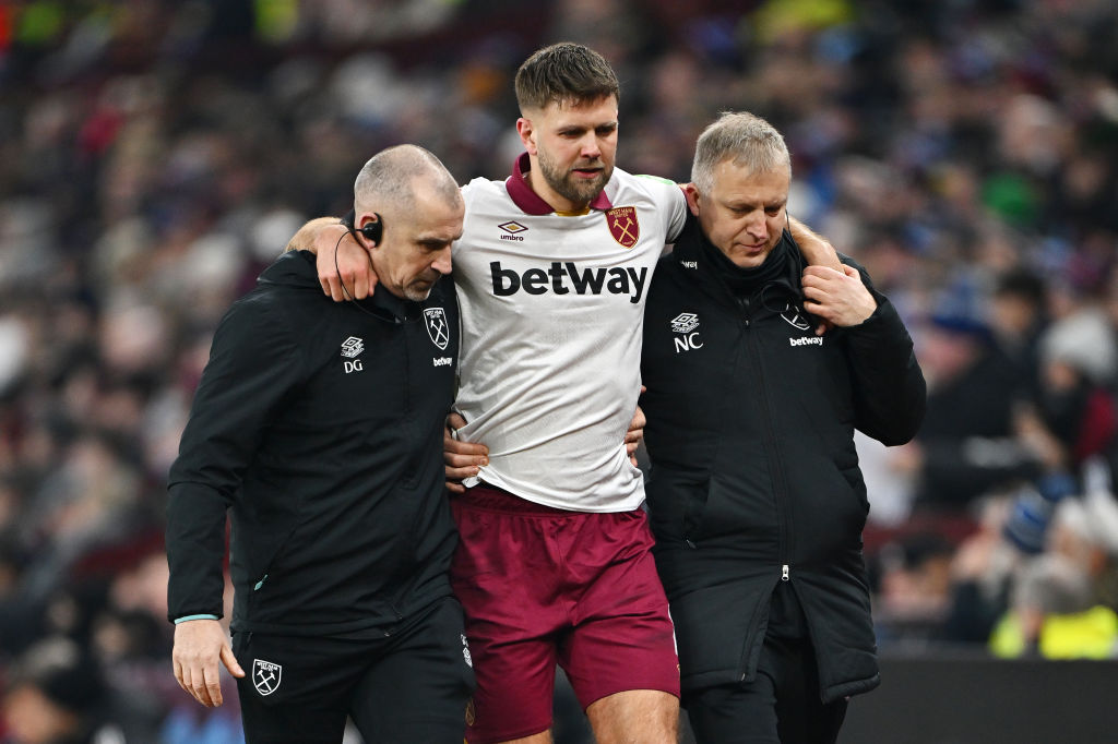 Niclas Füllkrug being helped off at Aston Villa