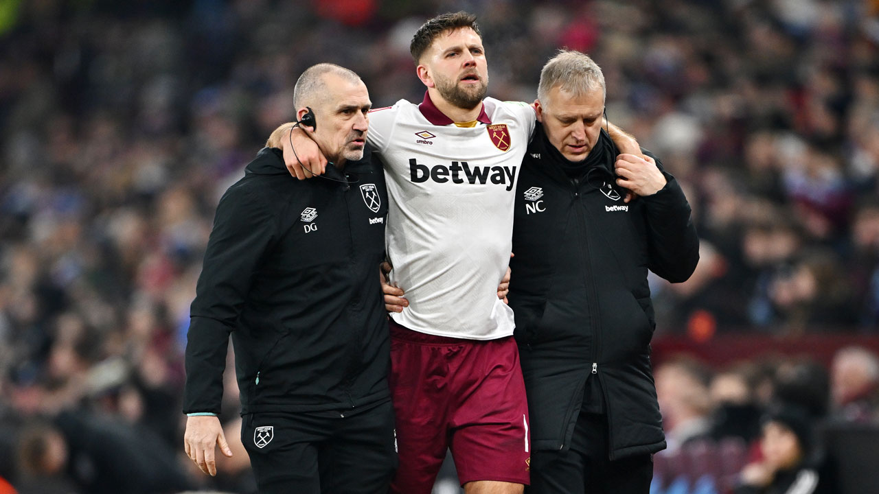 Niclas Füllkrug being helped off at Aston Villa