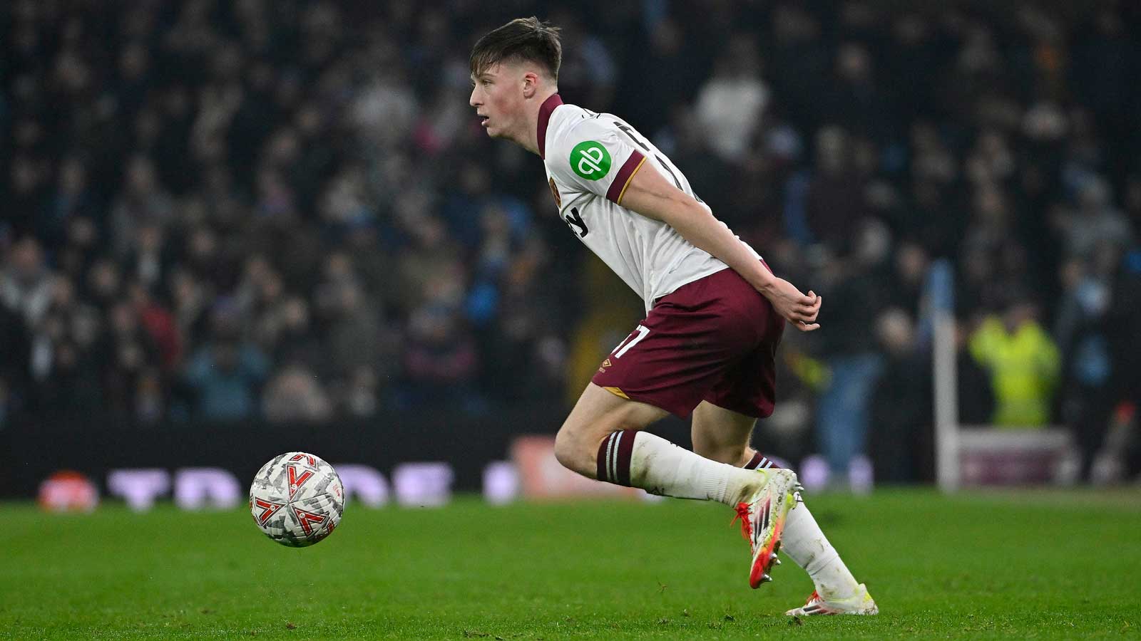 Ollie Scarles in action at Aston Villa