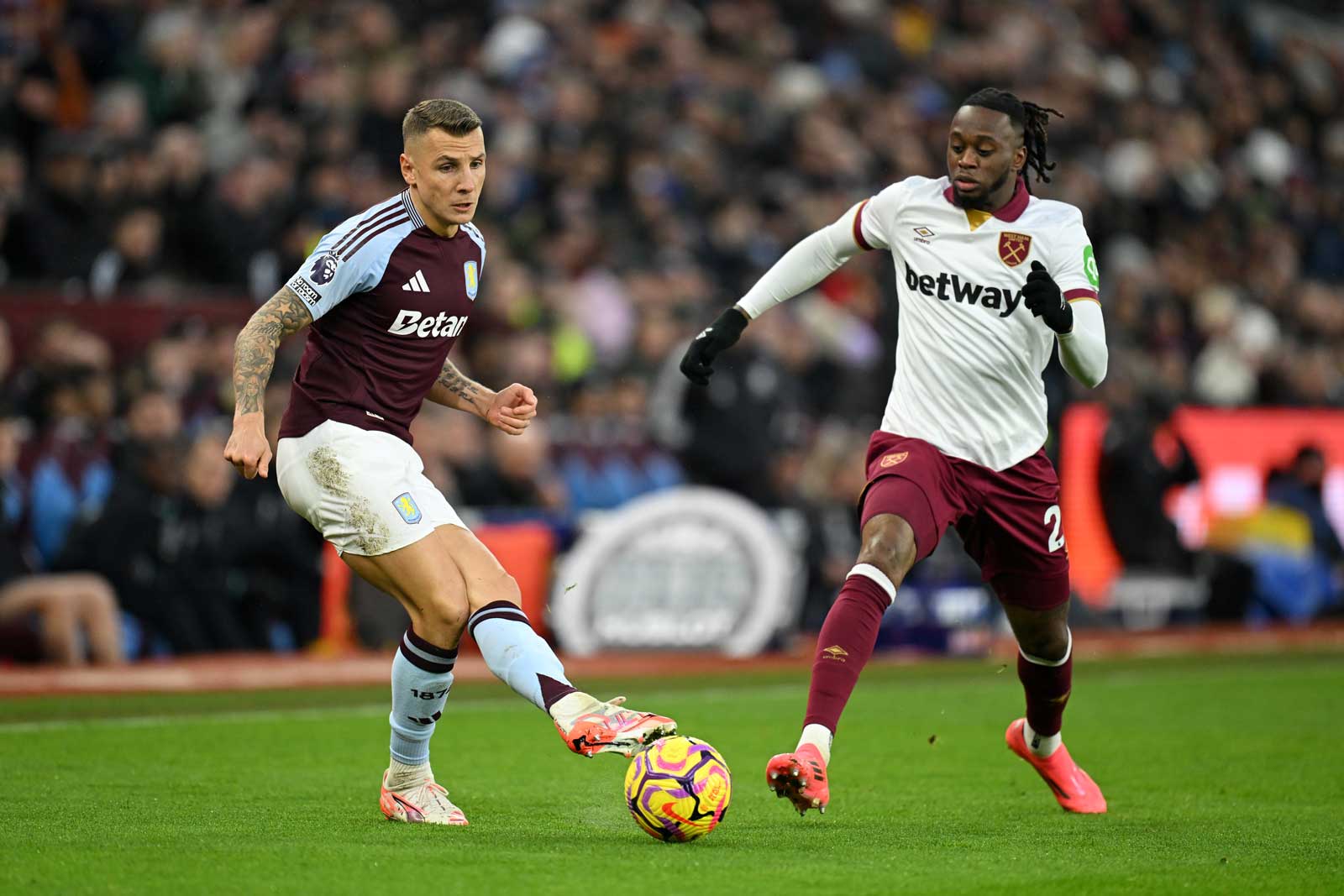 Aaron Wan-Bissaka challenges Lucas Digne