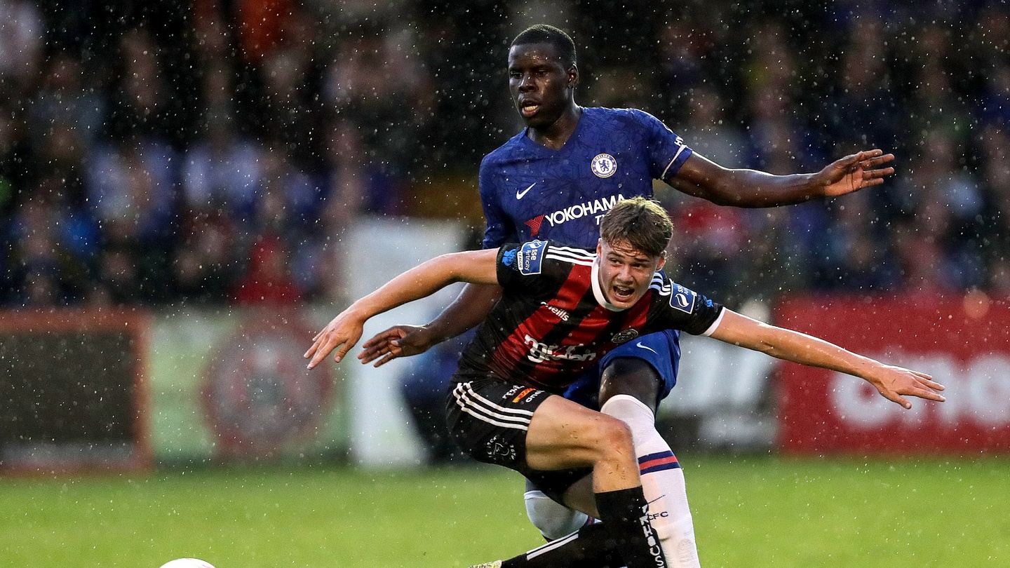 A 14-year-old Evan Ferguson in action against Chelsea's Kurt Zouma in 2019