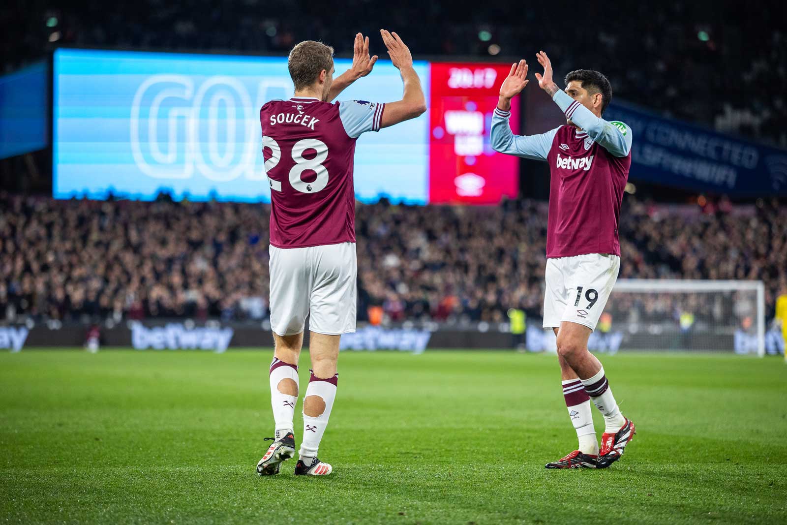 Tomáš Souček celebrates with Edson Álvarez