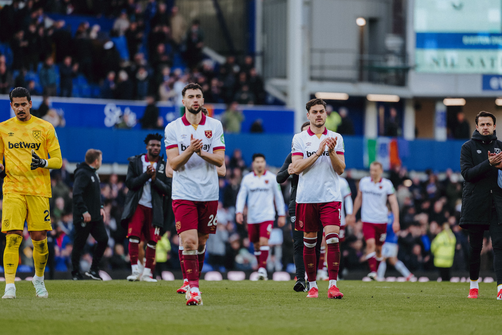 Maximilian KIlman and Dinos Mavropanos applaud the Hammers fans at full-time