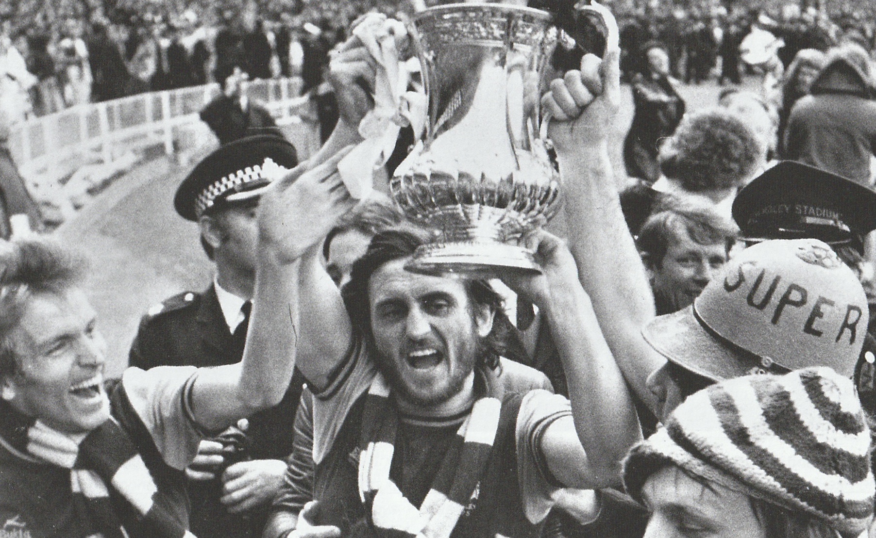 Frank Lampard celebrates the first of his two FA Cup victories in 1975. 