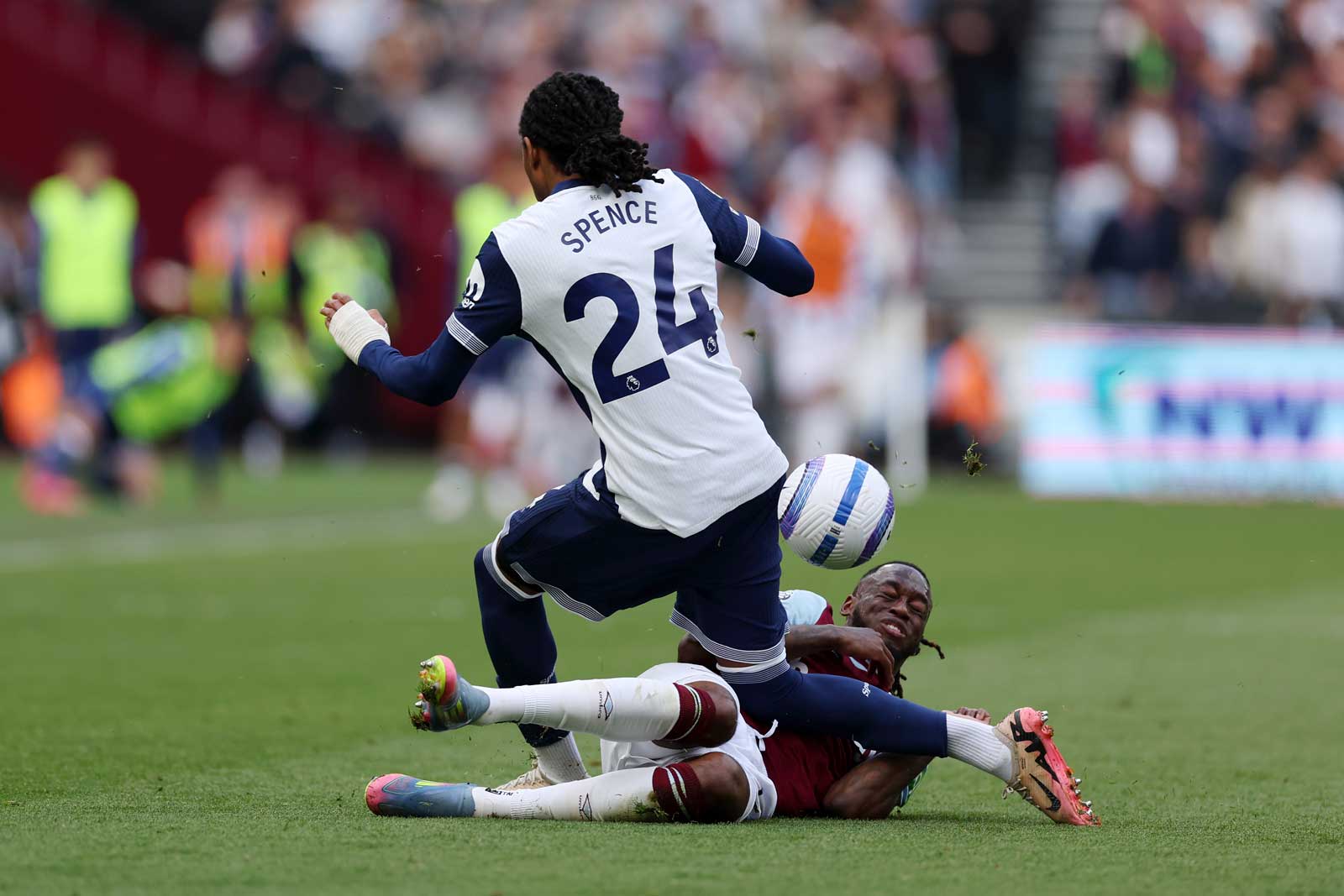 Aaron Wan-Bissaka challenges Tottenham's Djed Spence