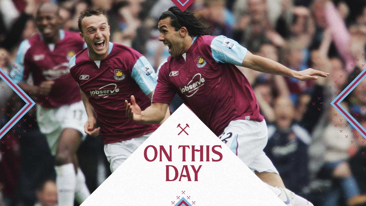 Mark Noble and Carlos Tevez celebrate a goal against Bolton Wanderers