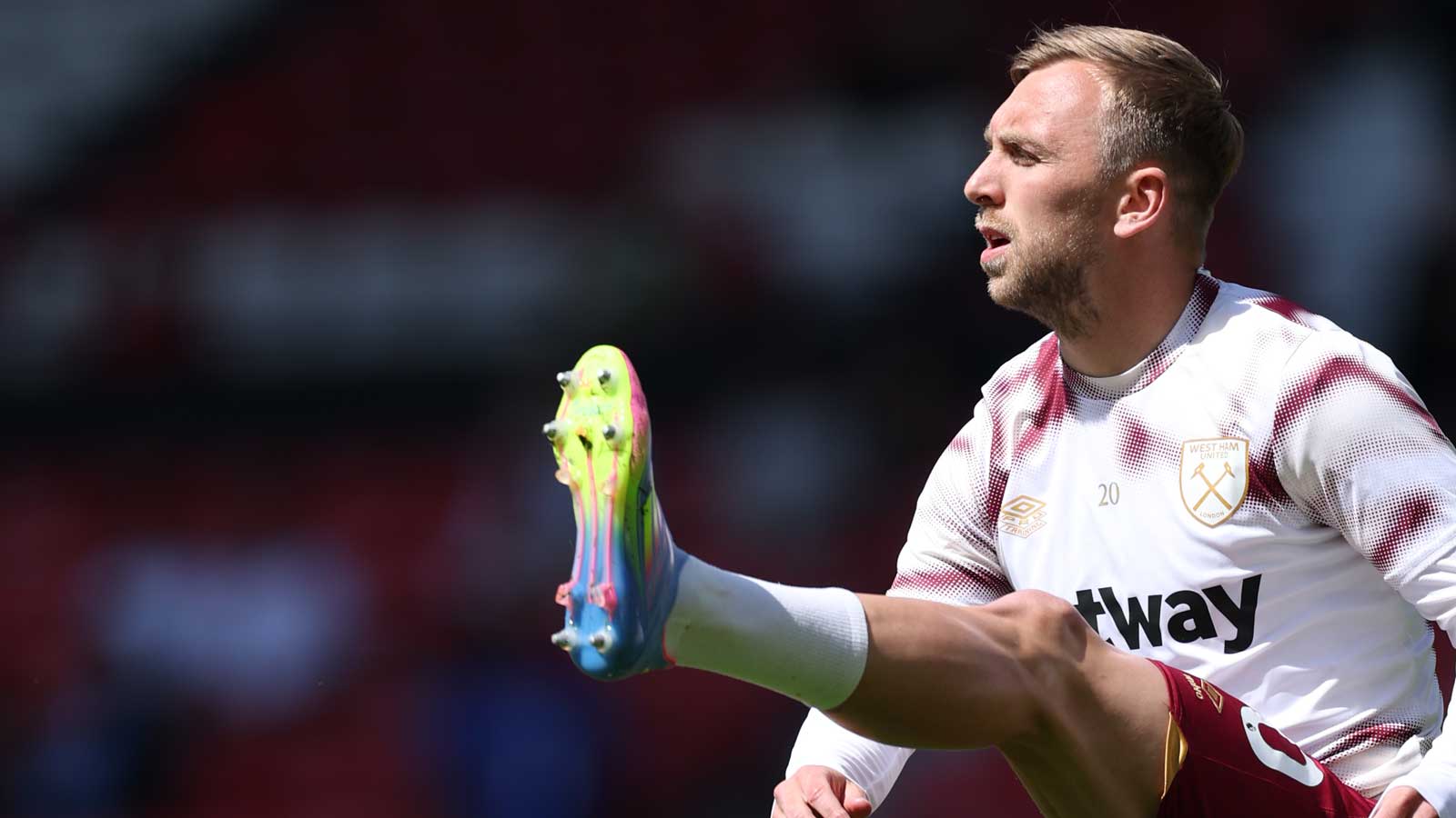 Jarrod Bowen warms up at Manchester United