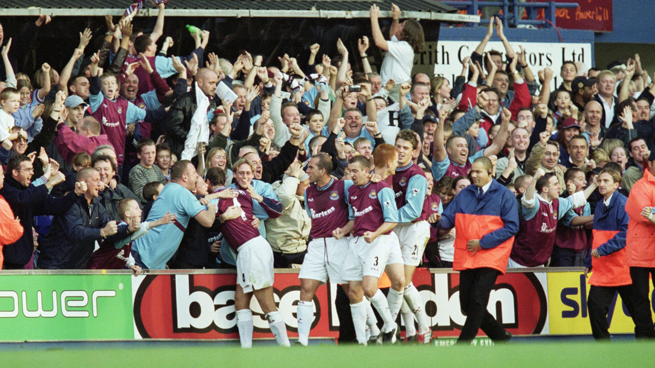 West Ham players and fans celebrate during a 3-2 Premier League win at Ipswich Town in October 2001