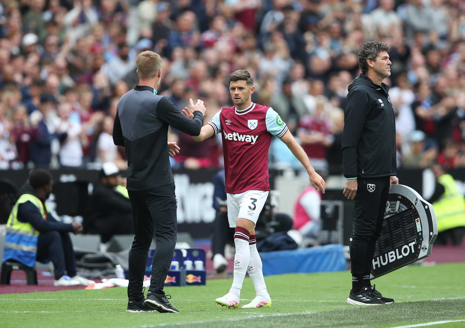 Graham Potter shakes Aaron Cresswell's hand
