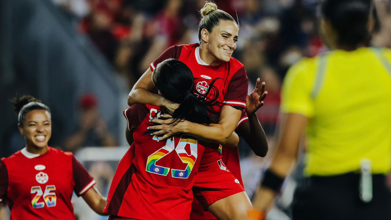 Shelina Zadorsky celebrates scoring for Canada