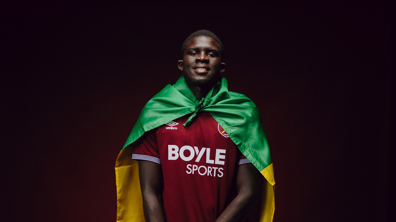 El Hadji Malick Diouf in Senegal flag